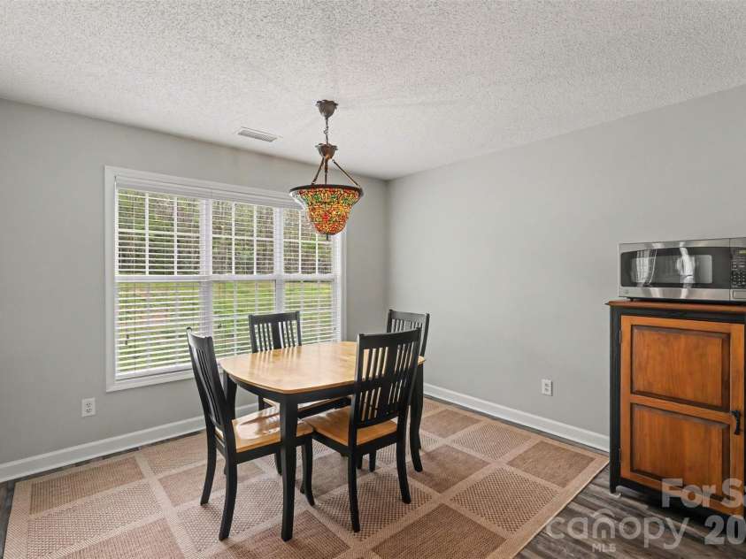 4404 Stonefield Drive, Charlotte, NC 28269.  MLS# CAR4364887, YatesRealty ID 14354. Dining area