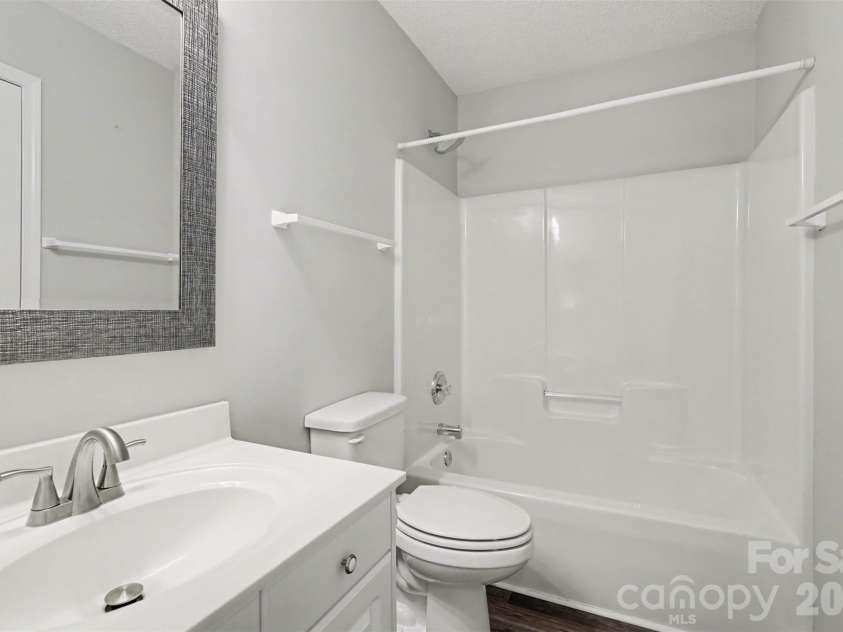 4404 Stonefield Drive, Charlotte, NC 28269.  MLS# CAR4364887, YatesRealty ID 14354. Second bathroom