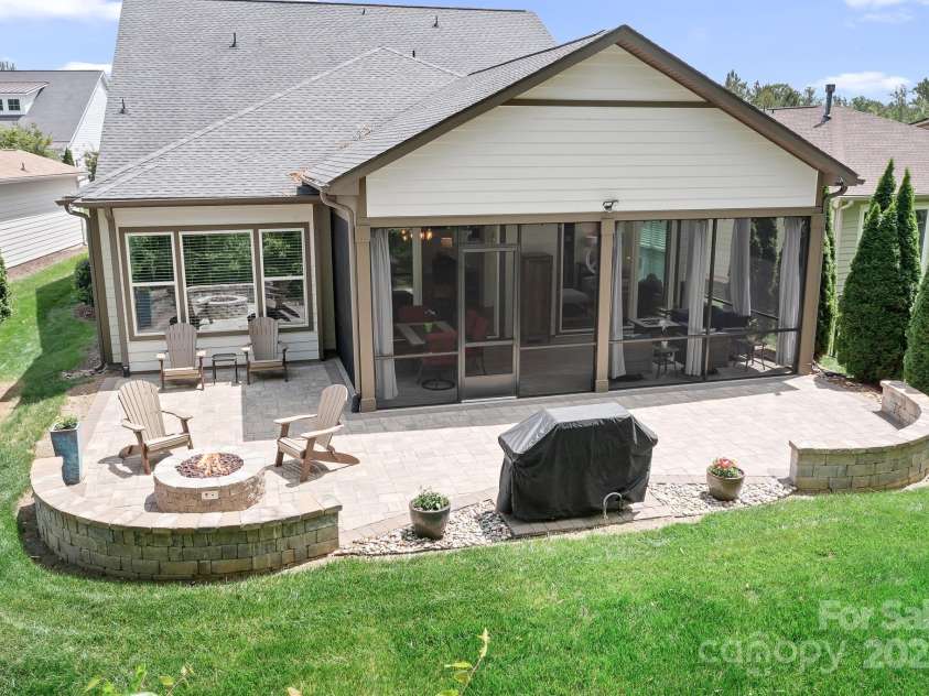 4902 Looking Glass Trail, Denver, NC 28037.  MLS# CAR4250662, YatesRealty ID 14354. Beautiful Backyard With Gas Firepit, Grill, Sitting Walls For Great Entertaining