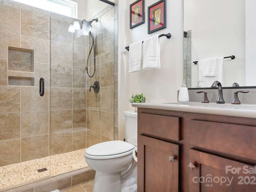 4902 Looking Glass Trail, Denver, NC 28037.  MLS# CAR4250662, YatesRealty ID 14354. Guest Bathroom With Beautiful Shower