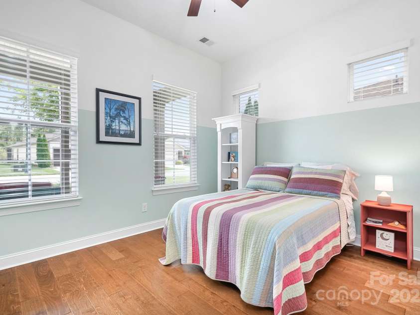 4902 Looking Glass Trail, Denver, NC 28037.  MLS# CAR4250662, YatesRealty ID 14354. Guest Bedroom With Engineered Hardwood Flooring