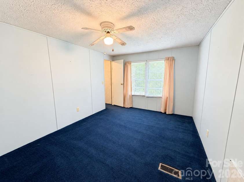 121 Haystack Lane, Olin, NC 28660.  MLS# CAR4429024, YatesRealty ID 14355. 