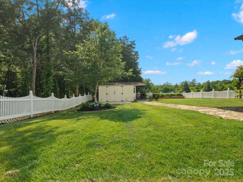 2521 Neely Store Road, Rock Hill, SC 29730.  MLS# CAR4258625, YatesRealty ID 14356. Side Yard