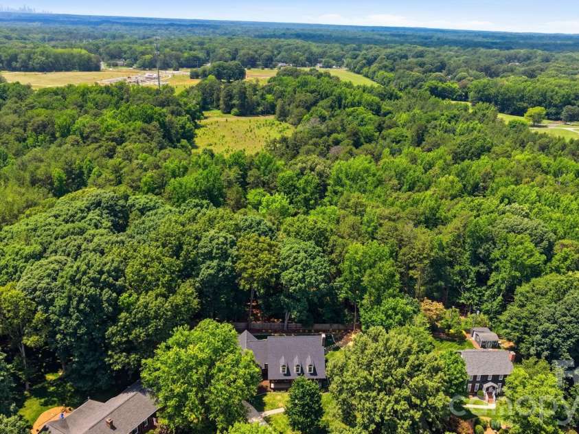 5243 Mintridge Road, Mint Hill, NC 28227.  MLS# CAR4358106, YatesRealty ID 14357. Ezell Community Park is seen in the 1:00 position