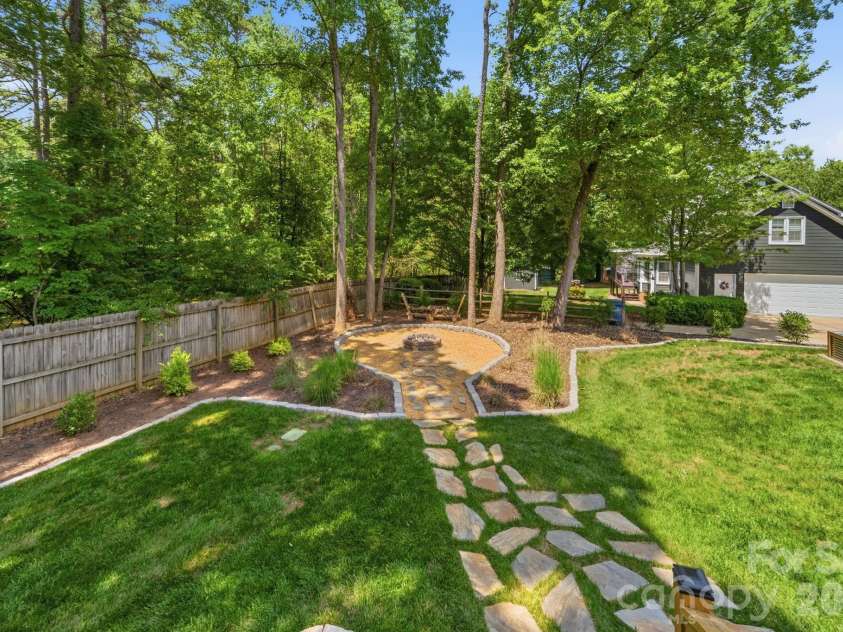5243 Mintridge Road, Mint Hill, NC 28227.  MLS# CAR4358106, YatesRealty ID 14357. Fire pit area