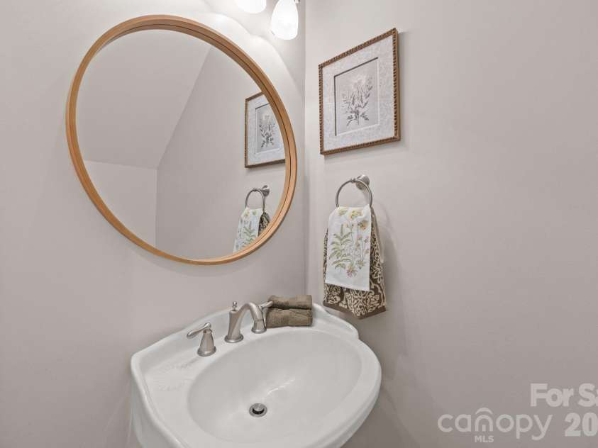 5243 Mintridge Road, Mint Hill, NC 28227.  MLS# CAR4358106, YatesRealty ID 14357. First floor half bath