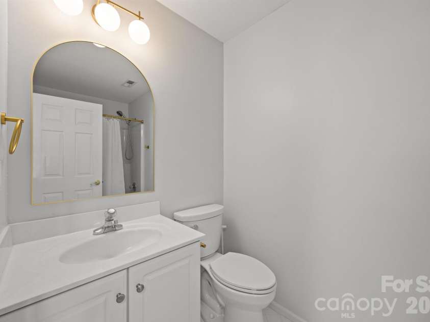 5243 Mintridge Road, Mint Hill, NC 28227.  MLS# CAR4358106, YatesRealty ID 14357. Second floor full bathroom with tub and shower