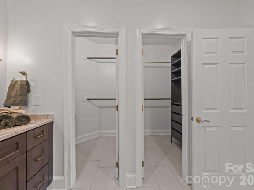 5243 Mintridge Road, Mint Hill, NC 28227.  MLS# CAR4358106, YatesRealty ID 14357. Two closets with custom shelving