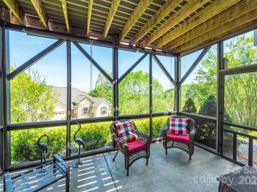 59 Carriage Highlands Court, Hendersonville, NC 28791.  MLS# CAR4243182, YatesRealty ID 14360. 