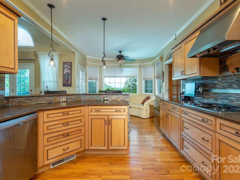 59 Carriage Highlands Court, Hendersonville, NC 28791.  MLS# CAR4243182, YatesRealty ID 14360. 