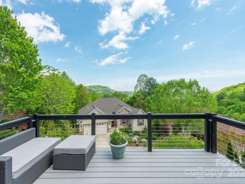 59 Carriage Highlands Court, Hendersonville, NC 28791.  MLS# CAR4243182, YatesRealty ID 14360. Approximately 2500, in elevation At this elevation, enjoy views and a mild four-season climate with cooler summers .