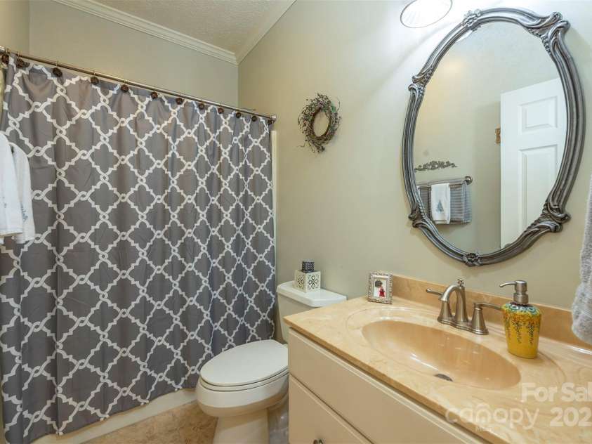 59 Carriage Highlands Court, Hendersonville, NC 28791.  MLS# CAR4243182, YatesRealty ID 14360. Full bathroom on Main Level