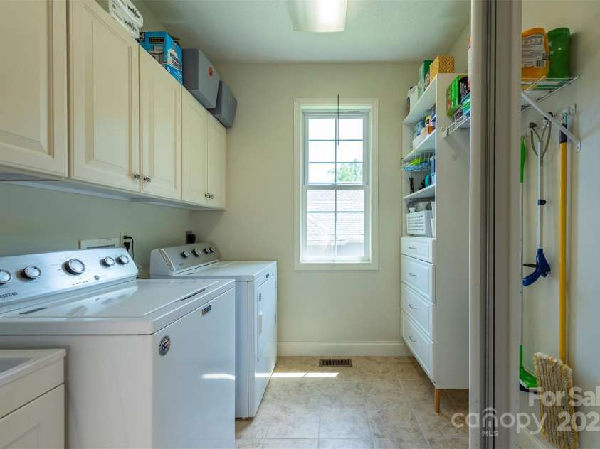 59 Carriage Highlands Court, Hendersonville, NC 28791.  MLS# CAR4243182, YatesRealty ID 14360. Laundry Room on Main Level