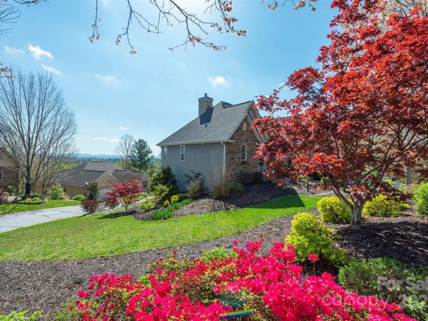 59 Carriage Highlands Court, Hendersonville, NC 28791.  MLS# CAR4243182, YatesRealty ID 14360. Live the good life at Carriage Park with access to a clubhouse, pool, tennis, and pickleball courts and more!