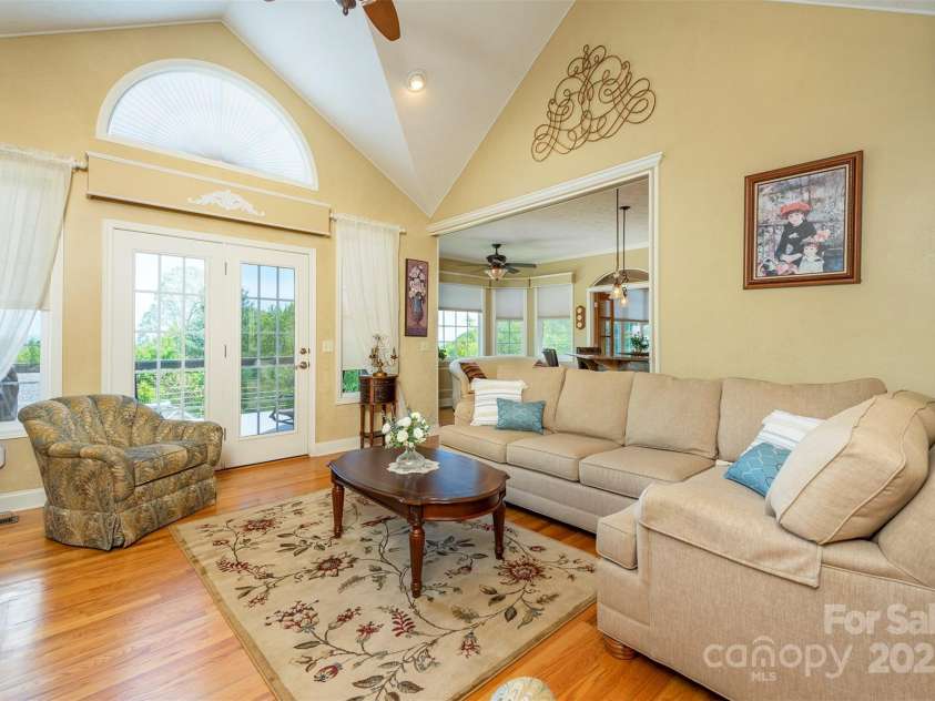 59 Carriage Highlands Court, Hendersonville, NC 28791.  MLS# CAR4243182, YatesRealty ID 14360. Love the look? Some furniture could stay with the right offer!