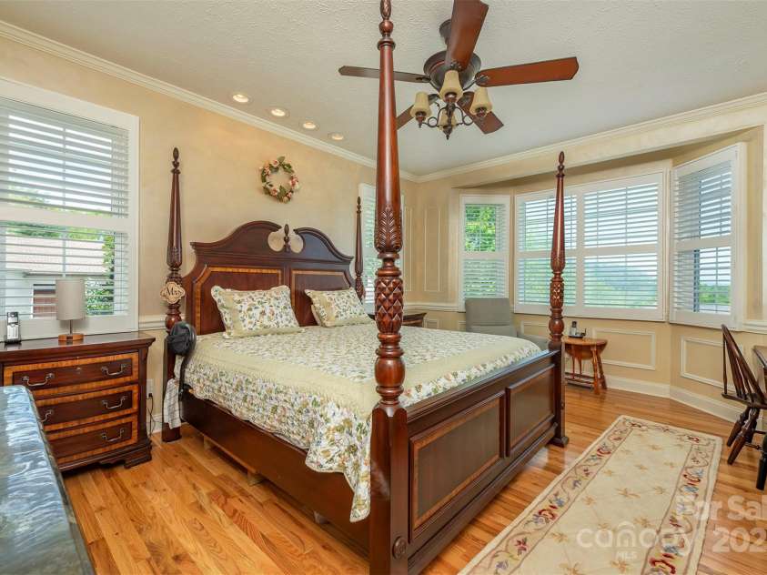 59 Carriage Highlands Court, Hendersonville, NC 28791.  MLS# CAR4243182, YatesRealty ID 14360. Spacious Main bedroom with views!