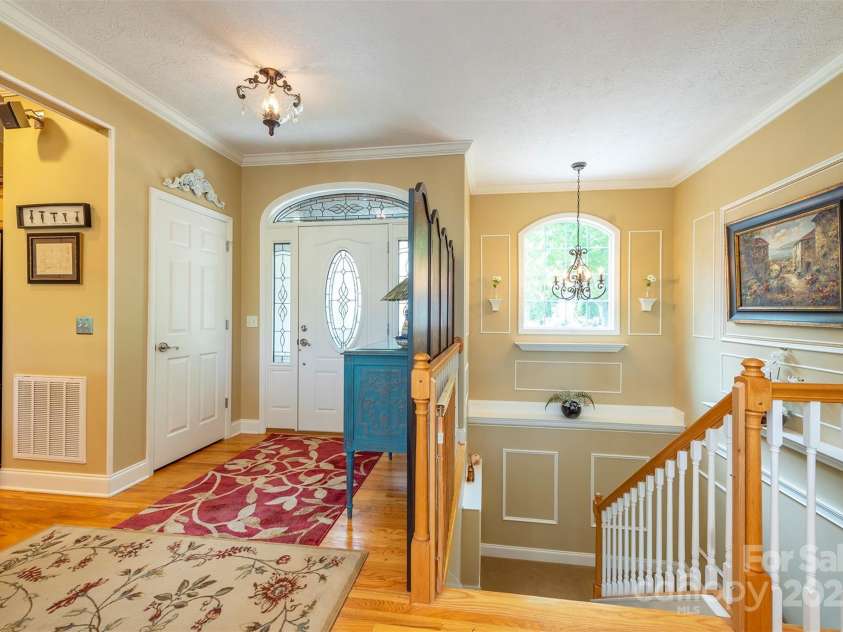 59 Carriage Highlands Court, Hendersonville, NC 28791.  MLS# CAR4243182, YatesRealty ID 14360. Take the elevator or stairs—easy access however you choose.