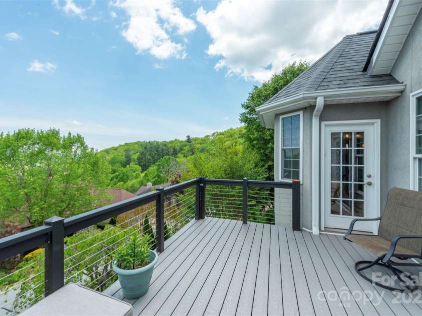 59 Carriage Highlands Court, Hendersonville, NC 28791.  MLS# CAR4243182, YatesRealty ID 14360. Year round views!