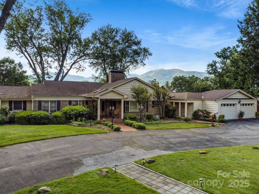 142 Country Club Drive, Waynesville, NC 28786.  MLS# CAR4242045, YatesRealty ID 14365. 