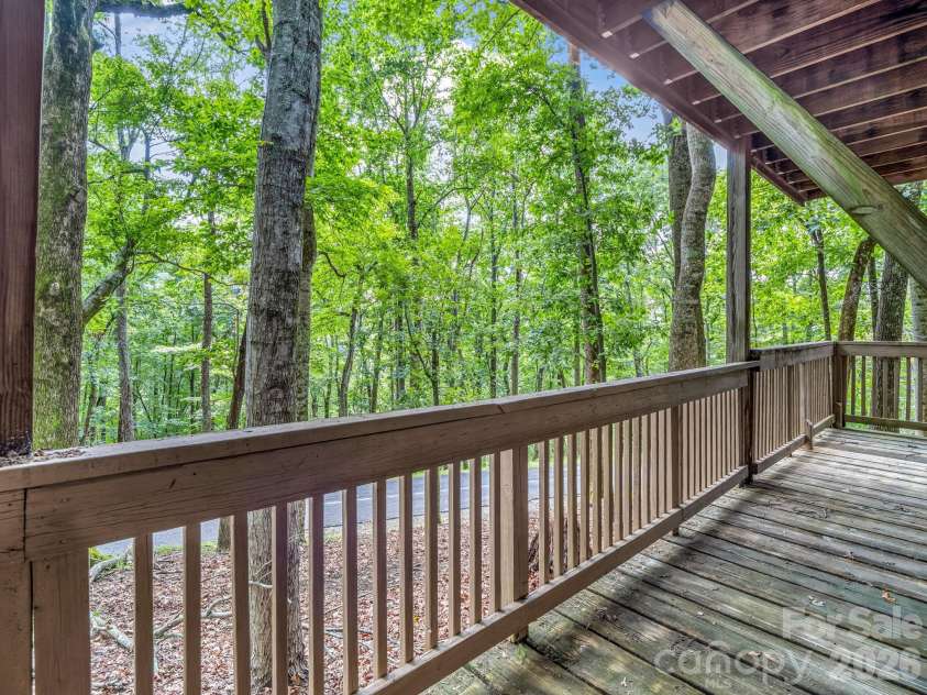 10 Chestnut Ridge Road, Mills River, NC 28759.  MLS# CAR4412466, YatesRealty ID 14367. Lower level deck