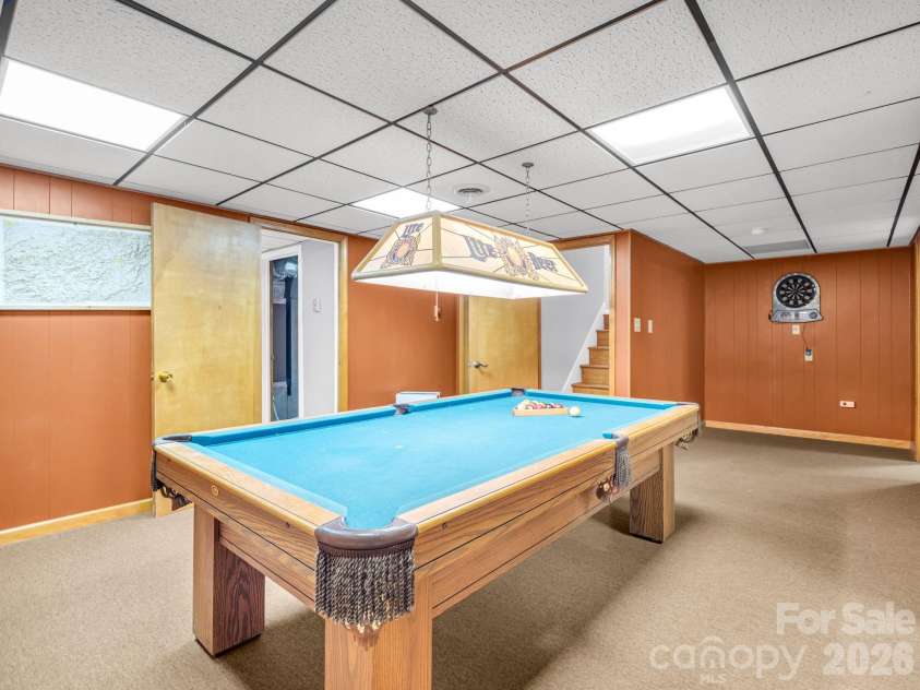 10 Chestnut Ridge Road, Mills River, NC 28759.  MLS# CAR4412466, YatesRealty ID 14367. Lower level Den/game room