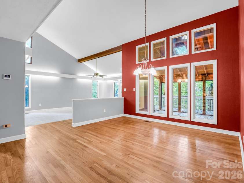 10 Chestnut Ridge Road, Mills River, NC 28759.  MLS# CAR4412466, YatesRealty ID 14367. View from Kitchen, toward Dining Room & Living Room w/ vaulted ceiling
