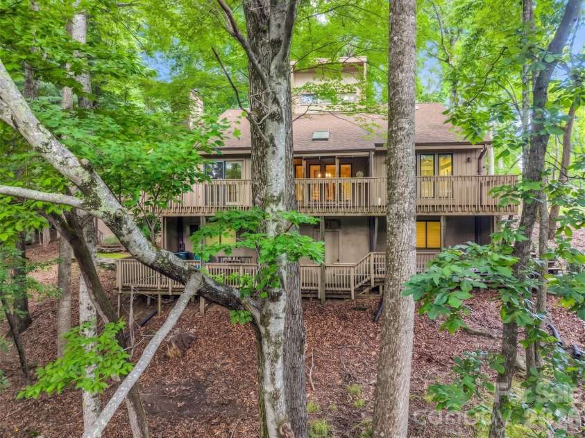10 Chestnut Ridge Road, Mills River, NC 28759.  MLS# CAR4412466, YatesRealty ID 14367. View from rear, double decks
