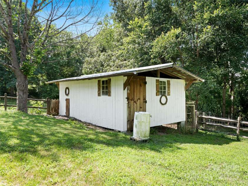 34 Ivy Lane, Fletcher, NC 28732.  MLS# CAR4242162, YatesRealty ID 14376. 2 Stall barn, tack and storage room