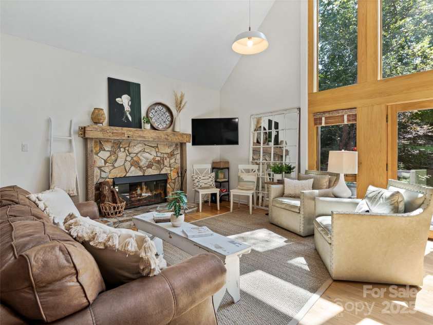 34 Ivy Lane, Fletcher, NC 28732.  MLS# CAR4242162, YatesRealty ID 14376. Wood burning fireplace a treat on those cool Mountain evenings