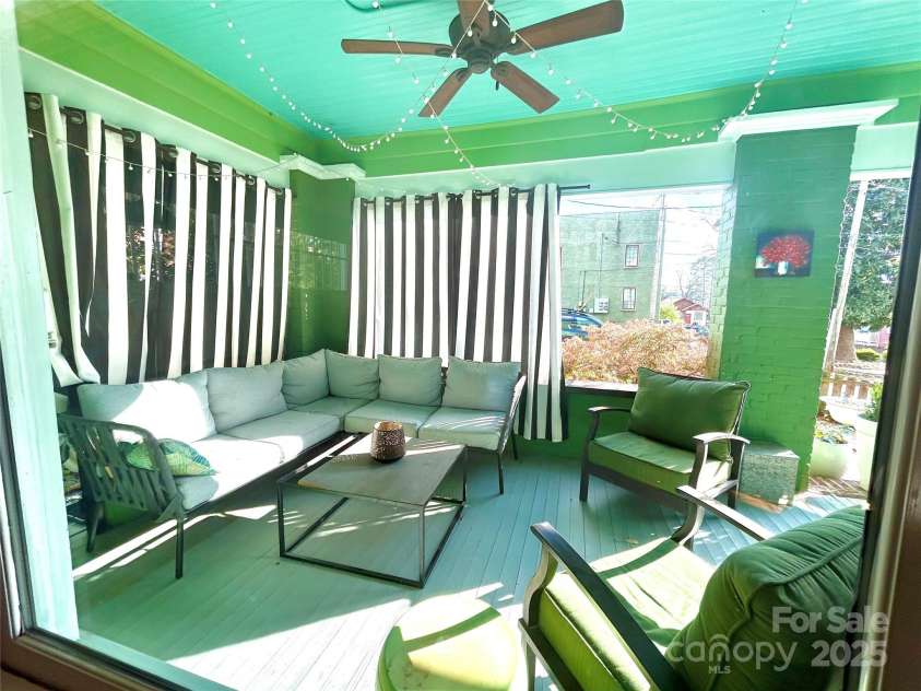 1000 Margaret Brown Street, Charlotte, NC 28202.  MLS# CAR4244039, YatesRealty ID 14379. Front porch is more like an outside living room
