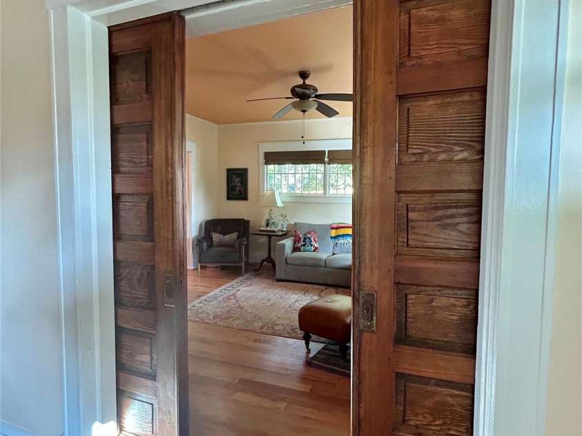 1000 Margaret Brown Street, Charlotte, NC 28202.  MLS# CAR4244039, YatesRealty ID 14379. Fully functional original pocket doors - one set between living dining/ the other between living / foyer