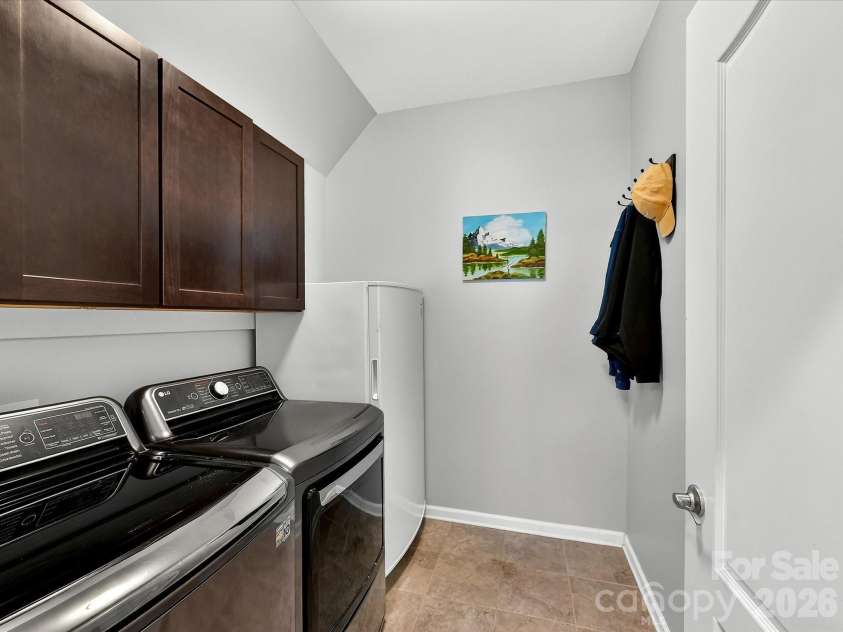 5095 Samoa Ridge Drive, Lancaster, SC 29720.  MLS# CAR4357204, YatesRealty ID 14379. Laundry with Tiled Flooring and Upper Cabinets