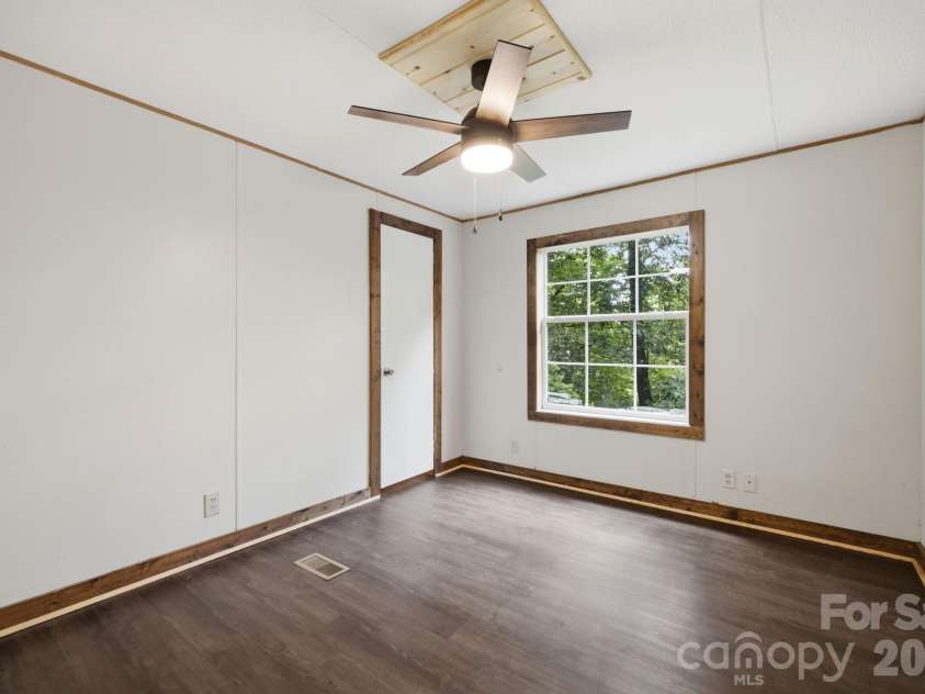 55 Twin Oaks Lane, Spruce Pine, NC 28777.  MLS# CAR4404051, YatesRealty ID 1438. Front Bedroom