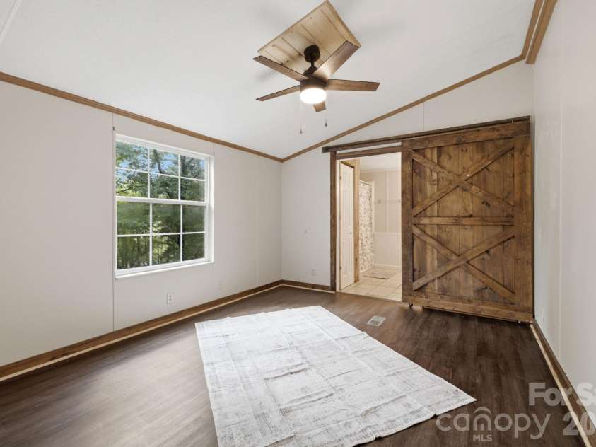 55 Twin Oaks Lane, Spruce Pine, NC 28777.  MLS# CAR4404051, YatesRealty ID 1438. Master Bedroom