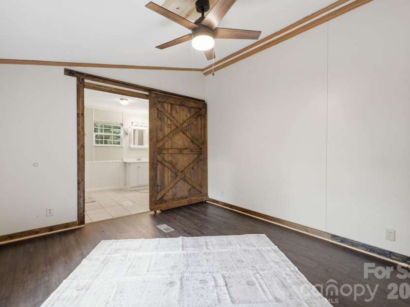 55 Twin Oaks Lane, Spruce Pine, NC 28777.  MLS# CAR4404051, YatesRealty ID 1438. Master Bedroom