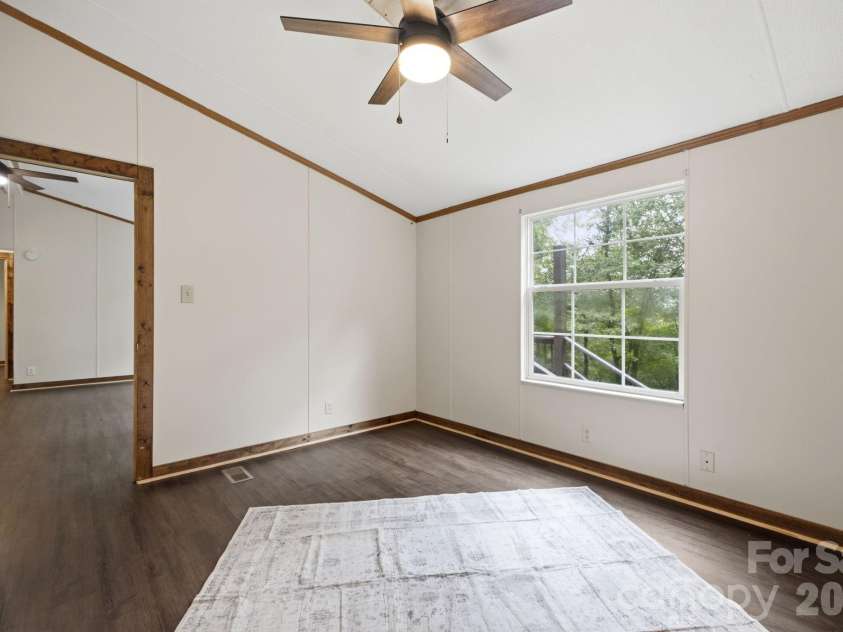 55 Twin Oaks Lane, Spruce Pine, NC 28777.  MLS# CAR4404051, YatesRealty ID 1438. Master Bedroom