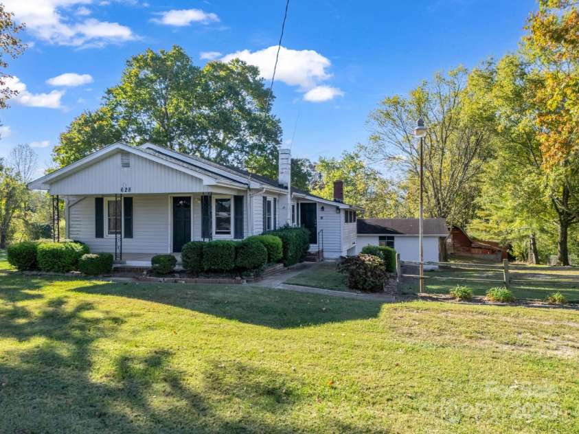 628 New Hope Road, Flat Rock, NC 28731.  MLS# CAR4326419, YatesRealty ID 1438. 