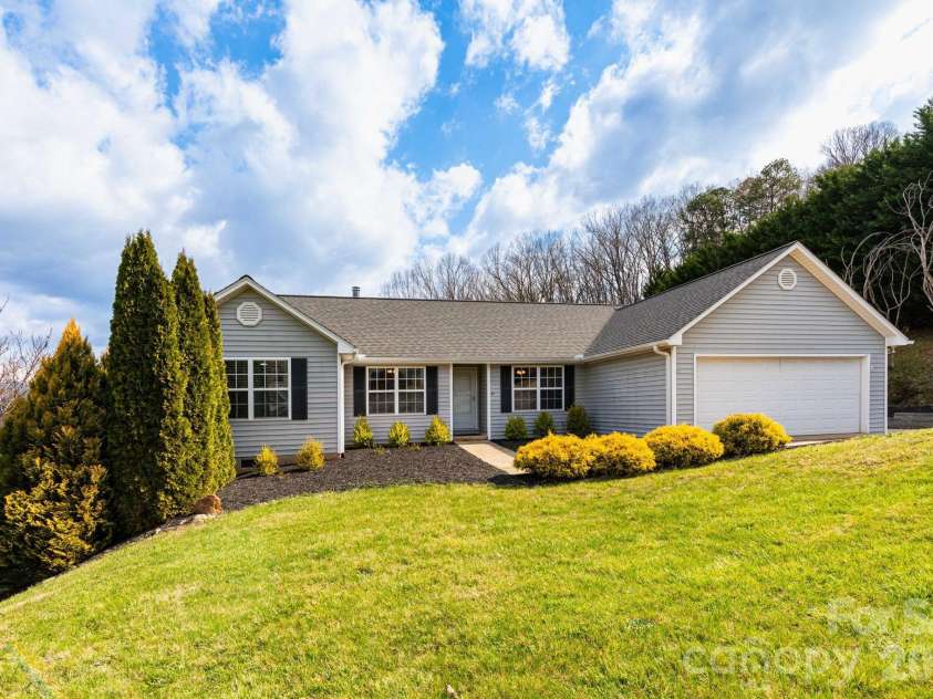 21 Lindon Cove Road, Candler, NC 28715.  MLS# CAR4361385, YatesRealty ID 14388. 