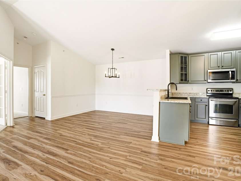 19777 Deer Valley Drive, Cornelius, NC 28031.  MLS# CAR4369434, YatesRealty ID 14389. Dining room/Kitchen
