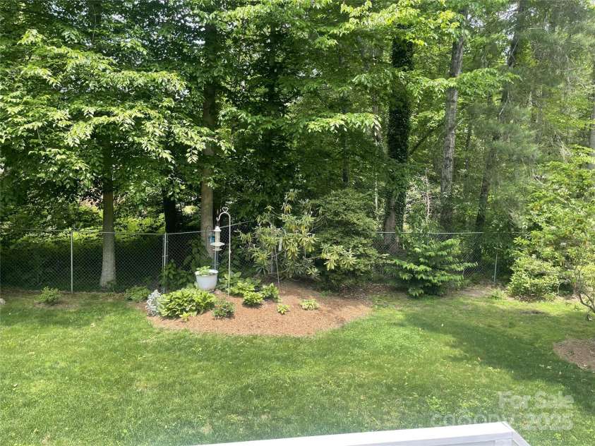 61 Greenwood Forest Drive, Etowah, NC 28729.  MLS# CAR4260594, YatesRealty ID 14389. 