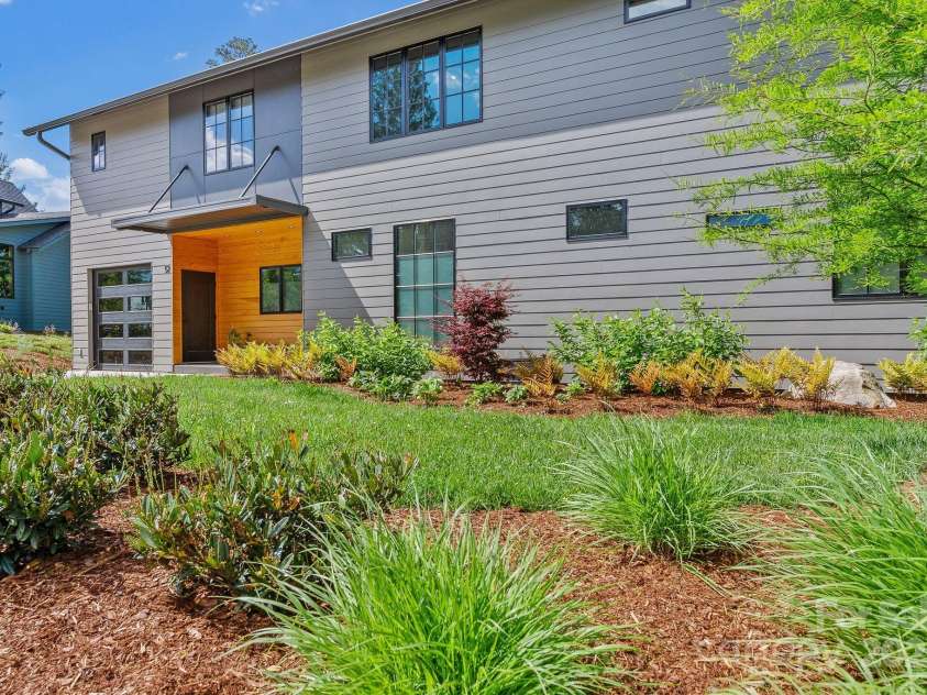 52 Malvern Walk, Asheville, NC 28806.  MLS# CAR4257541, YatesRealty ID 1439. Beautifully Landscaped modern home!