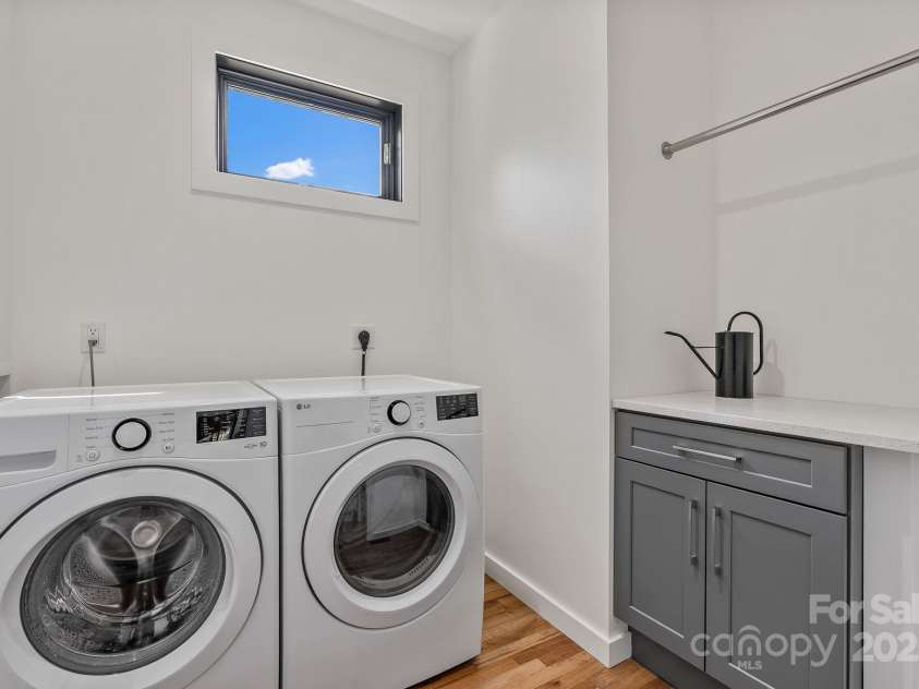 52 Malvern Walk, Asheville, NC 28806.  MLS# CAR4257541, YatesRealty ID 1439. Convenient Laundry with Storage on main level