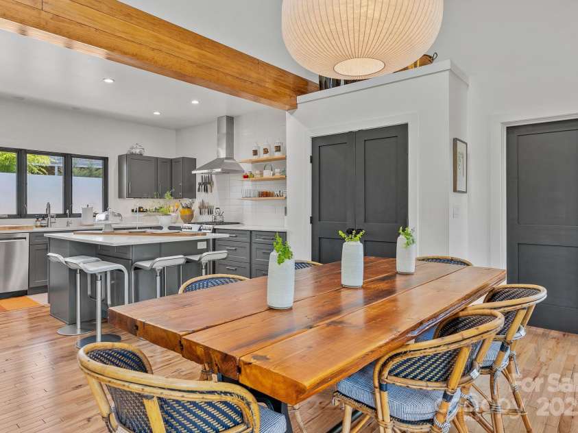 52 Malvern Walk, Asheville, NC 28806.  MLS# CAR4257541, YatesRealty ID 1439. Dining Flows to Kitchen with double door pantry
