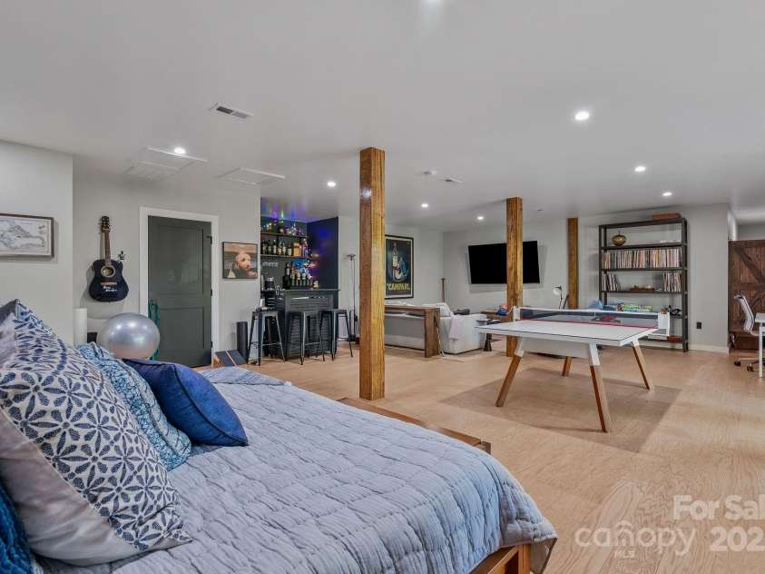 52 Malvern Walk, Asheville, NC 28806.  MLS# CAR4257541, YatesRealty ID 1439. Spacious Basement Level is party ready
