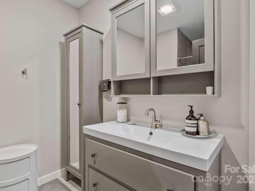 52 Malvern Walk, Asheville, NC 28806.  MLS# CAR4257541, YatesRealty ID 1439. Third Full Bathroom in basement with walk-in shower