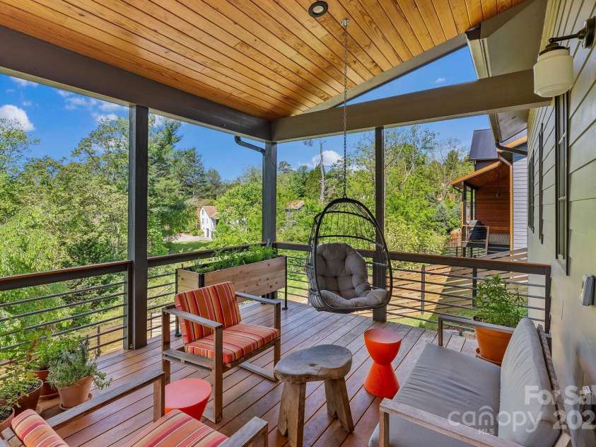 52 Malvern Walk, Asheville, NC 28806.  MLS# CAR4257541, YatesRealty ID 1439. Wonderful private covered rear deck to Unwind