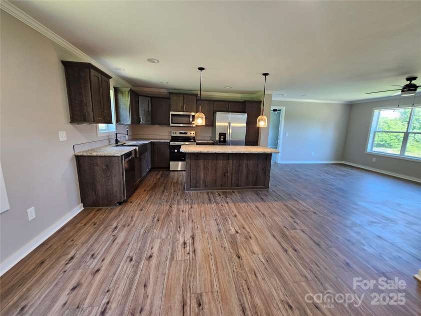 784 Severt Circle, Lenoir, NC 28645.  MLS# CAR4228434, YatesRealty ID 14393. Dining Room Leading into Kitchen
