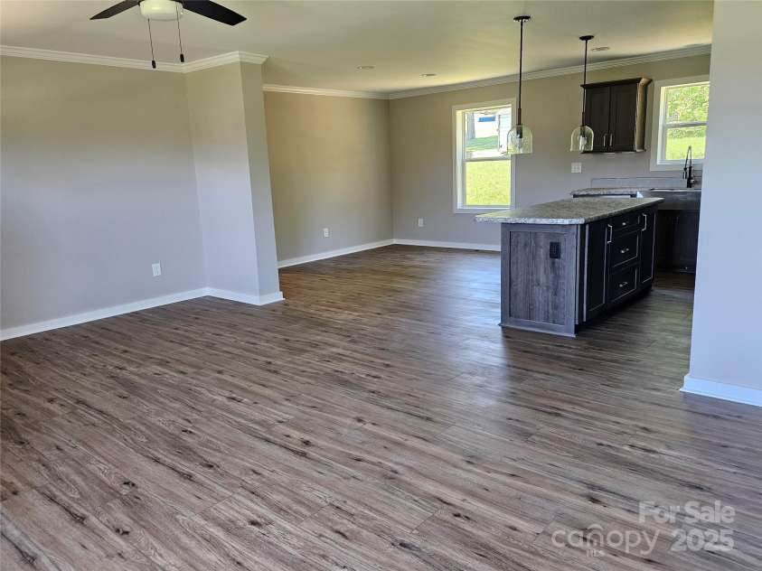 784 Severt Circle, Lenoir, NC 28645.  MLS# CAR4228434, YatesRealty ID 14393. Living Room Looking Into Kitchen & Dining Room