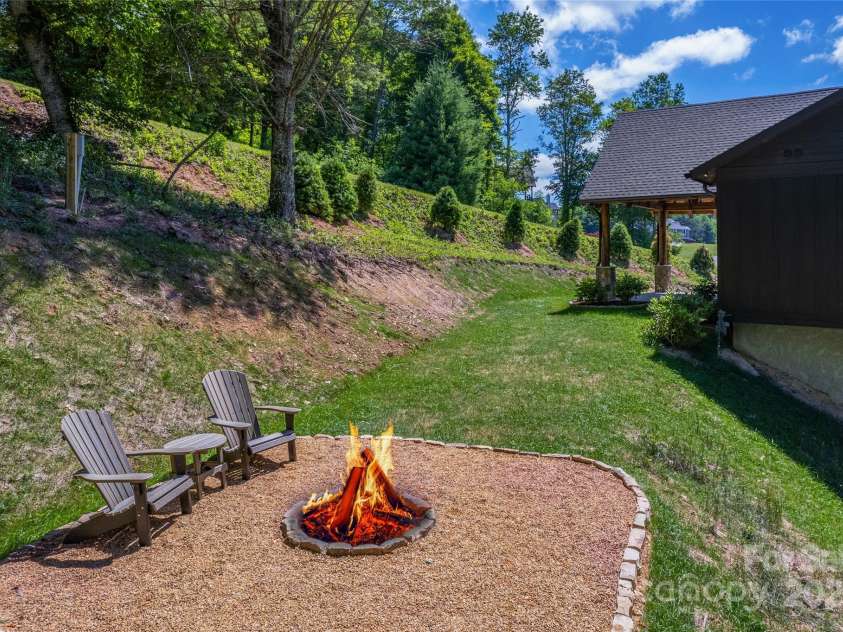 750 Silver Springs Drive, Banner Elk, NC 28604.  MLS# CAR4160928, YatesRealty ID 144. Fire pit to enjoy the majestic views and outdoor living