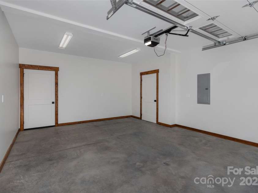 750 Silver Springs Drive, Banner Elk, NC 28604.  MLS# CAR4160928, YatesRealty ID 144. One car garage with service door and storage on basement level